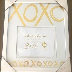 Photo frame fits 8 x 10 inch photo. Overall frame 15.5 x 17.5 inches